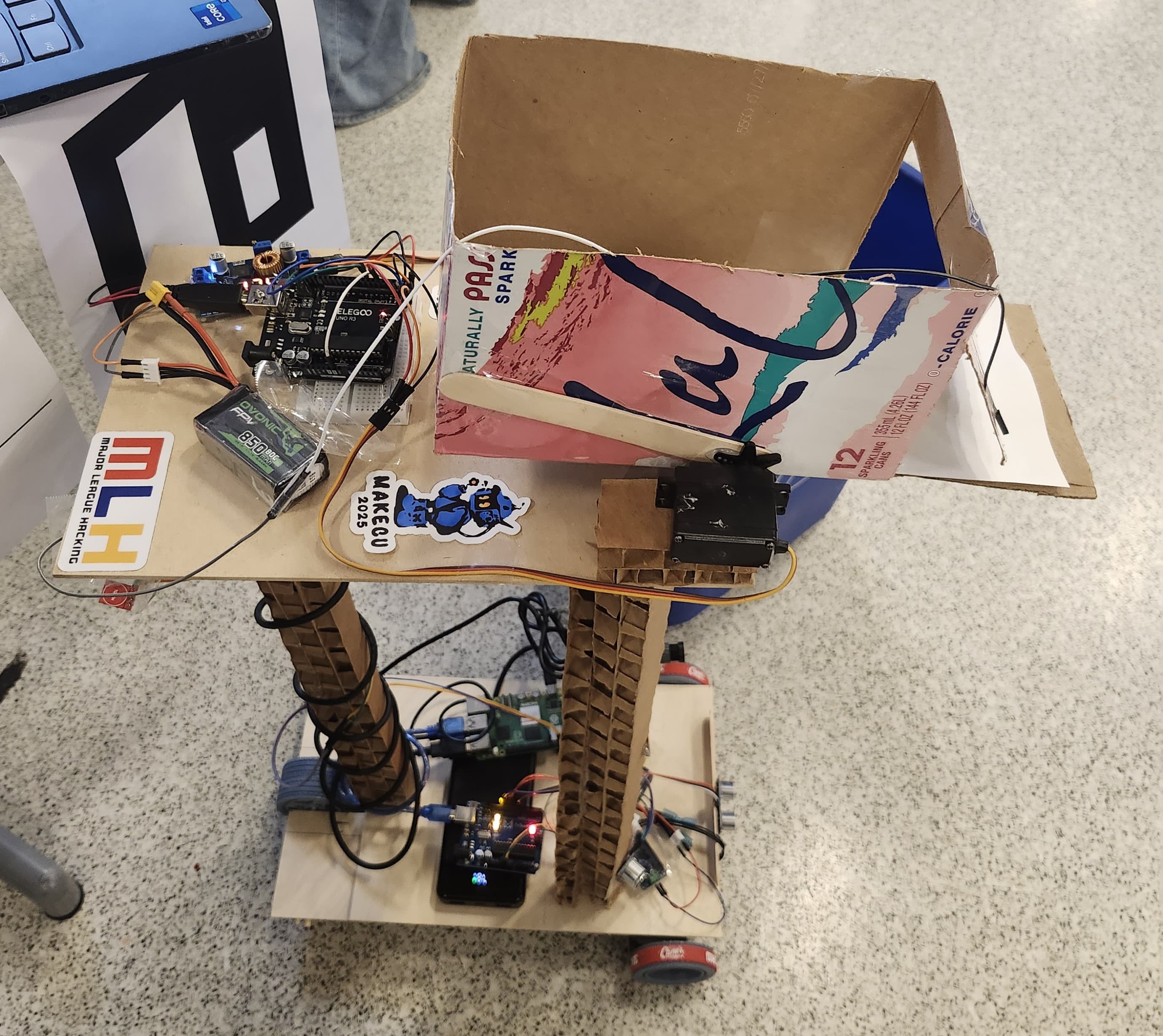 AutoDump autonomous self-emptying trash rover.